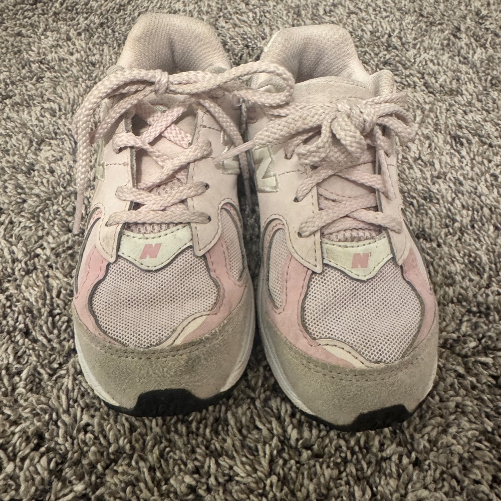 Girl’s New Balance pink sneakers